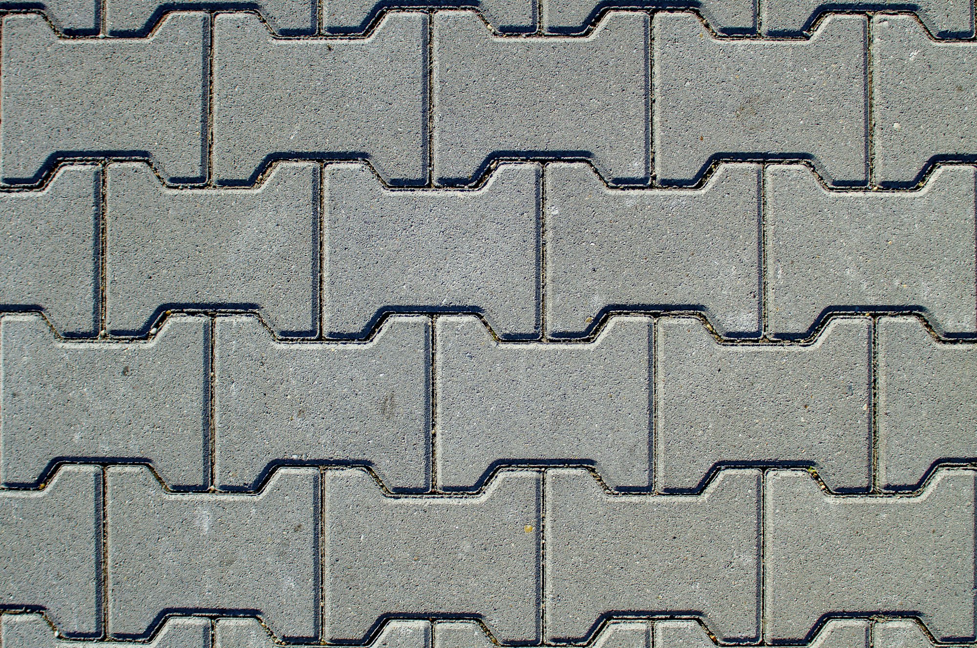 Texture of concrete pavement or sidewalk with paving slabs